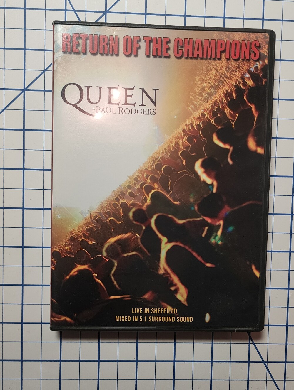 2/25$ Queen + Paul Rodgers "Return of the Champions" Live DVD - Black & Gold